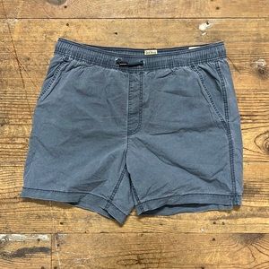 Navy elastic shorts.